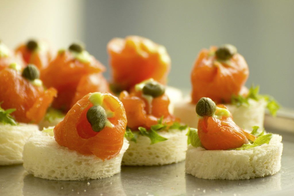 Salmon canapes at party table